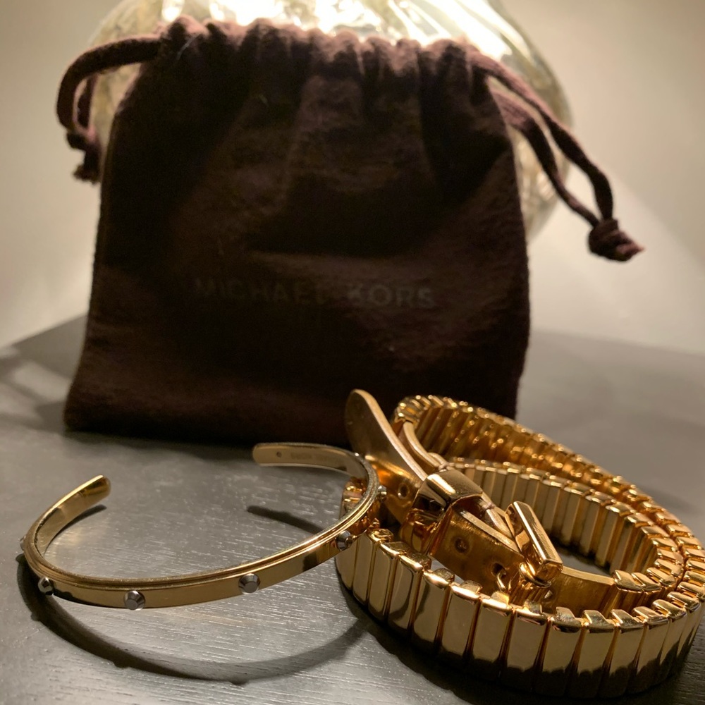 Michael Kors gold bracelets with storage bag